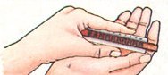 Hold your Marine Band in a 'ten-finger sandwhich', as shown, and you'll create a resonating air chamber that you can use to add a temolo or vibrato effect to your playing (pretend your hands are hinged together in the front and open and close them as rapidly as you like by moving onle the "outside" hand.)